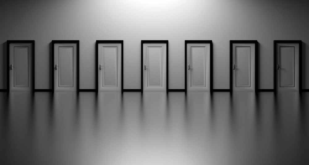 black and white decision doors opportunity